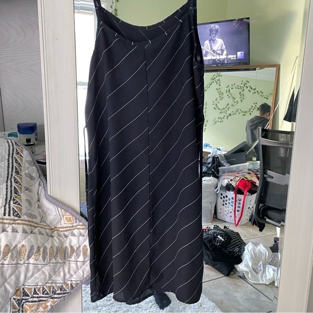 Loose fit spaghetti strapped summer dress.